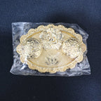 Ganesh embossed kumkum chopra showcasing delicate embossing and durable metal alloy material