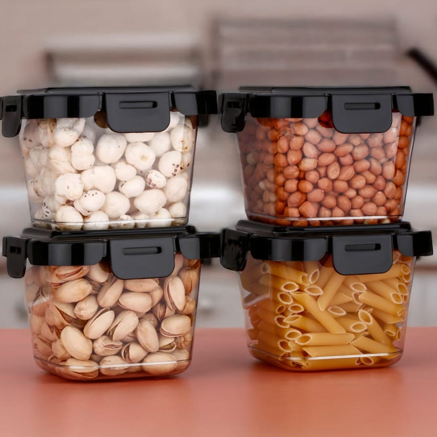 Clear 500ml plastic food container with a secure blue lid, showcasing its fresh-keeping ability.