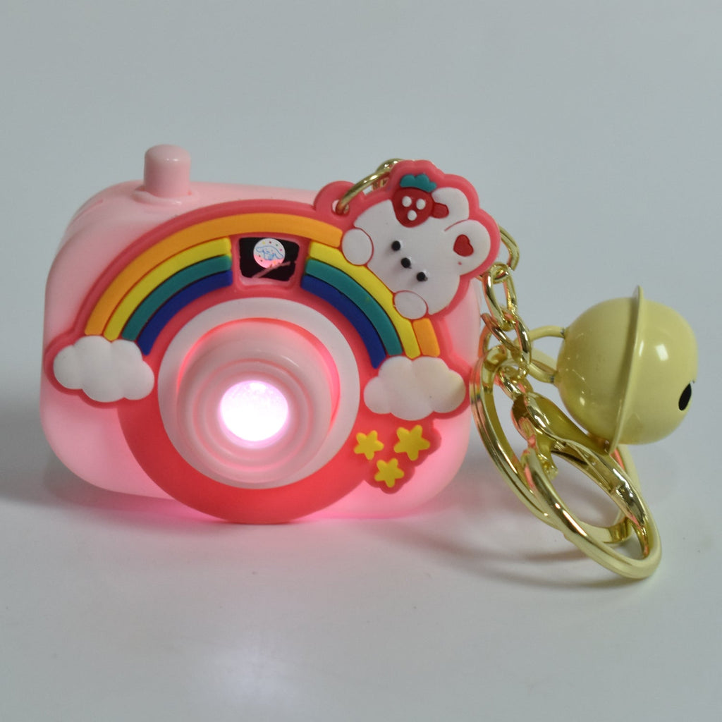 Side view of projective camera keychain on white background