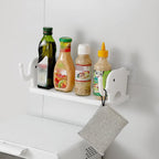 No-punch elephant wall shelf providing storage in a modern bathroom.