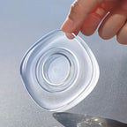 Nano gel pad securely holding a mobile phone on a car dashboard.