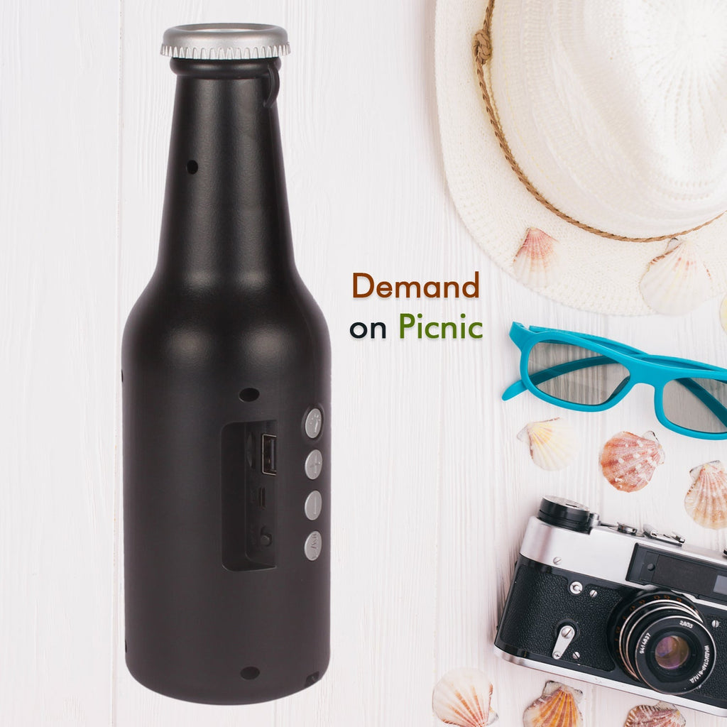 Audila Bottle Bluetooth Speaker with a charging cable and various connectivity options.