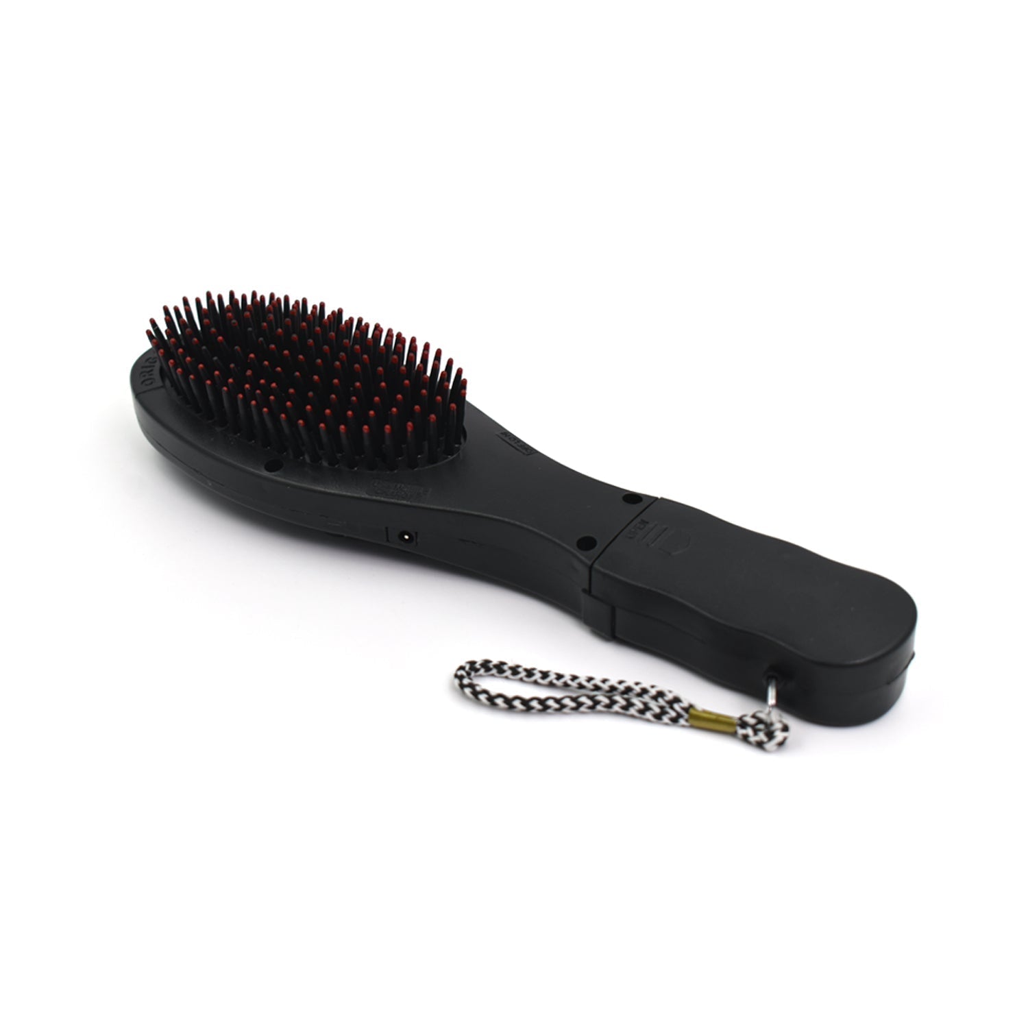 User holding the electric hair massager comb for a relaxing scalp massage.
