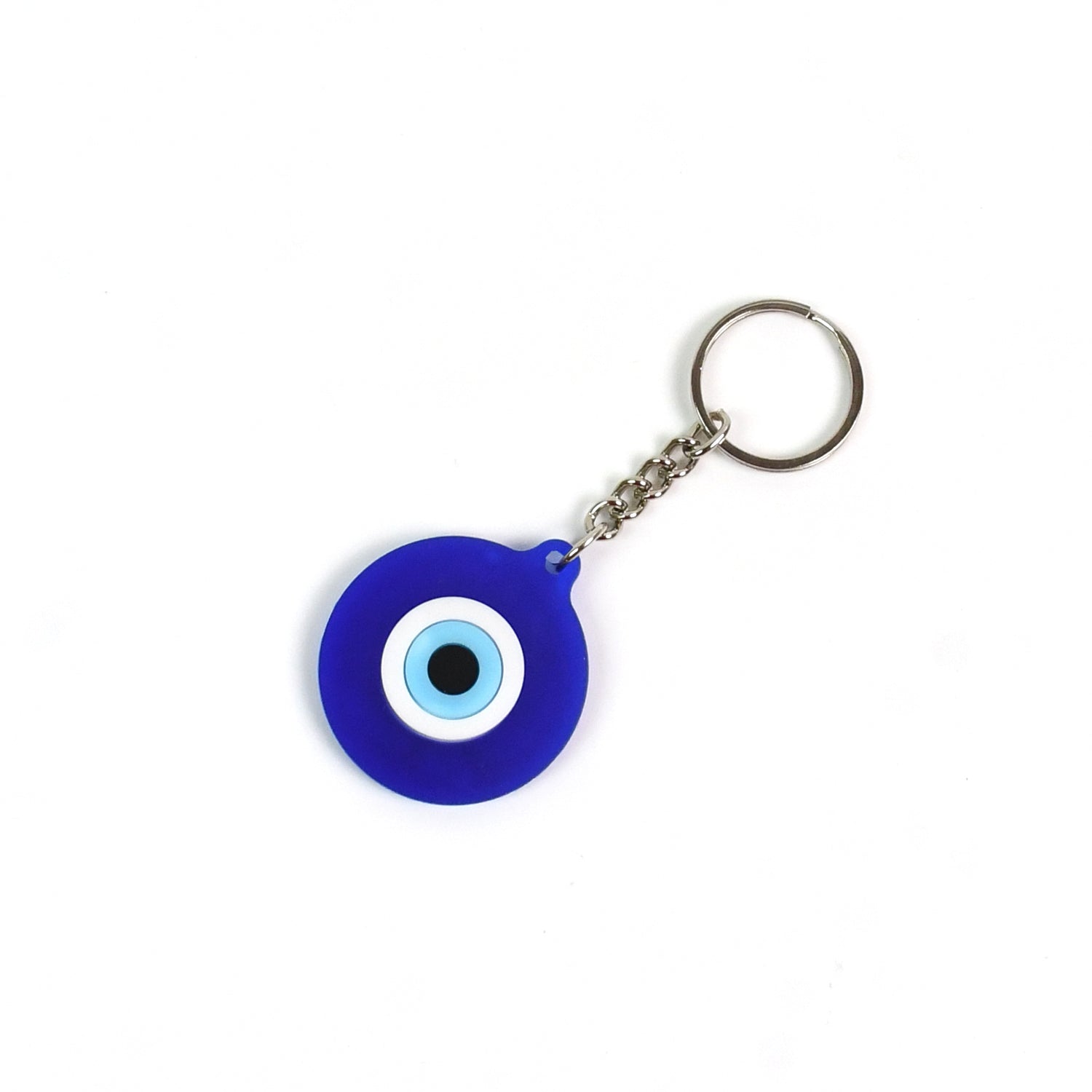 Protective evil eye charm keychain in blue hanging as a decorative accessory