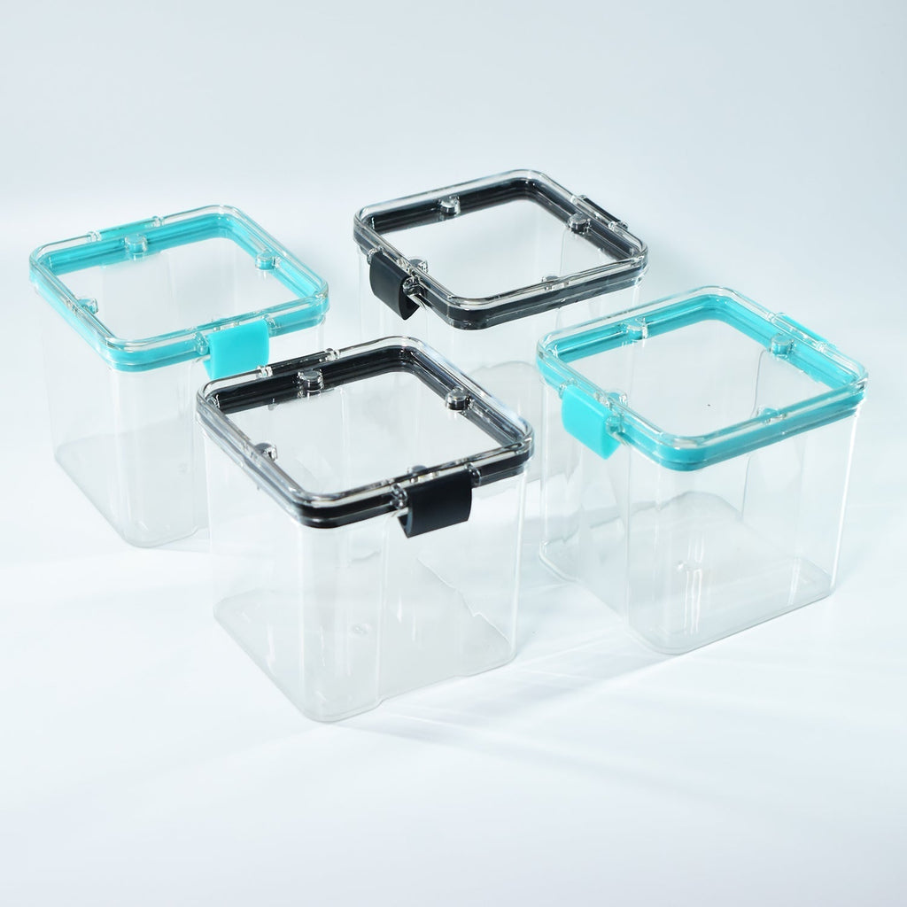 A set of four 700ml plastic food storage containers, perfect for storing dry goods.