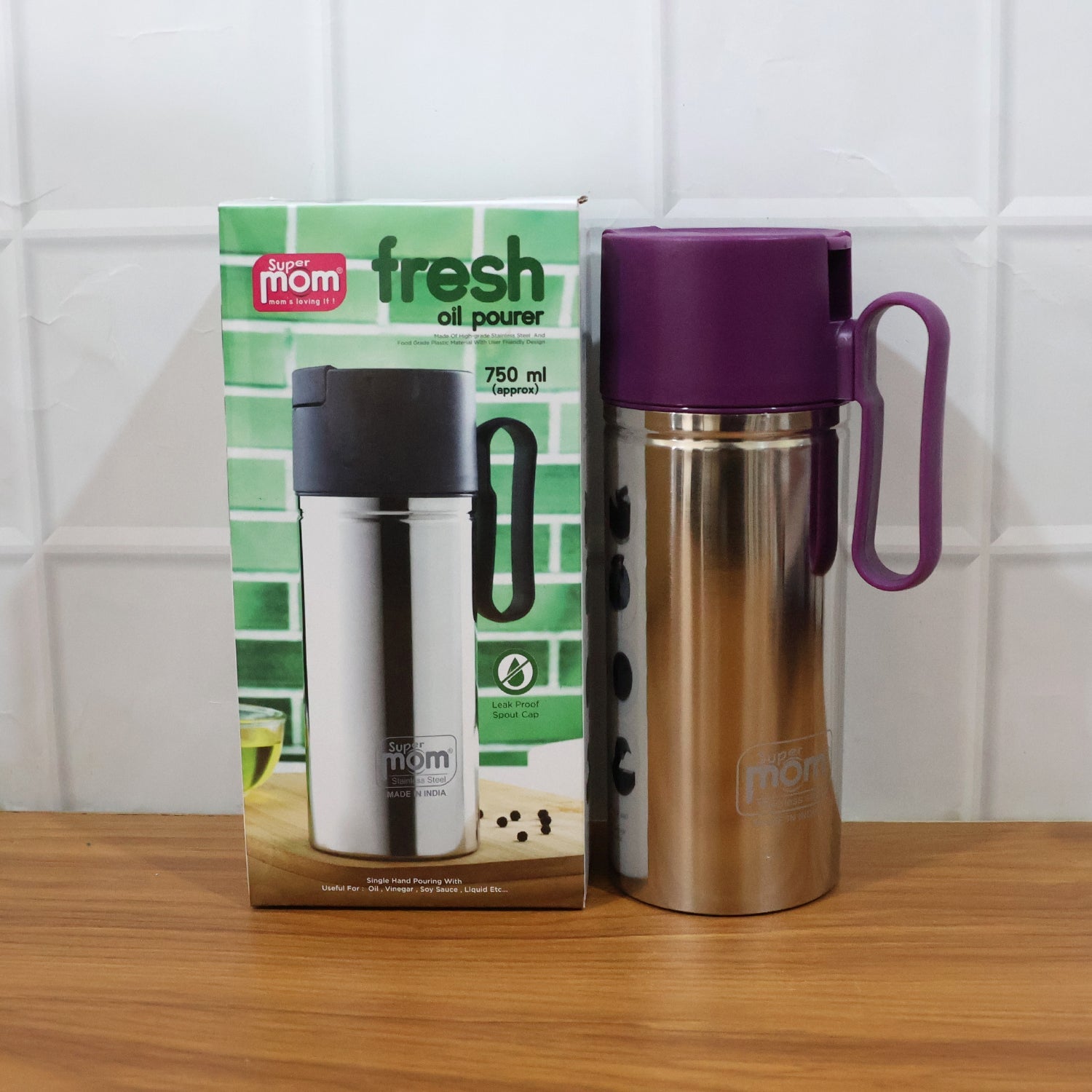 Close-up image of oil pourer spout designed to prevent drips and spills
