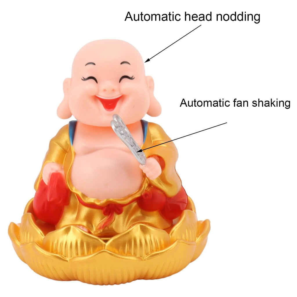 The Solar Buddha Car Ornament demonstrating its gentle head and hand movement.