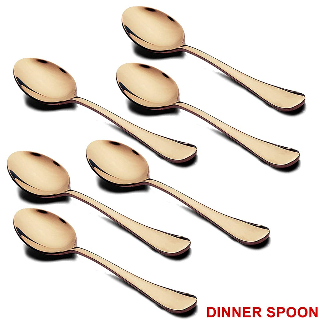 Close-up of the elegant gold dinner spoon and fork.
