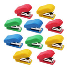 Set of small staplers and staple pins in multiple colors