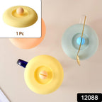 Close-up of the flexible Silicone Cup Lid creating a strong seal on a coffee mug, preventing spills.