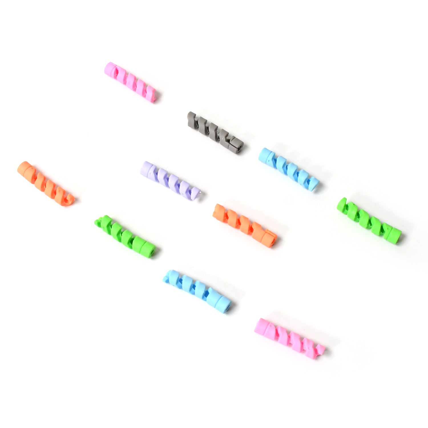 Assorted silicone spiral data cable protection units bundled together.