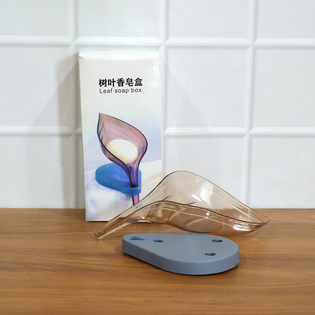 Designer soap holder in leaf design with water drain