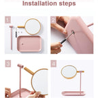 Minimalist round makeup mirror resting securely on stable stand