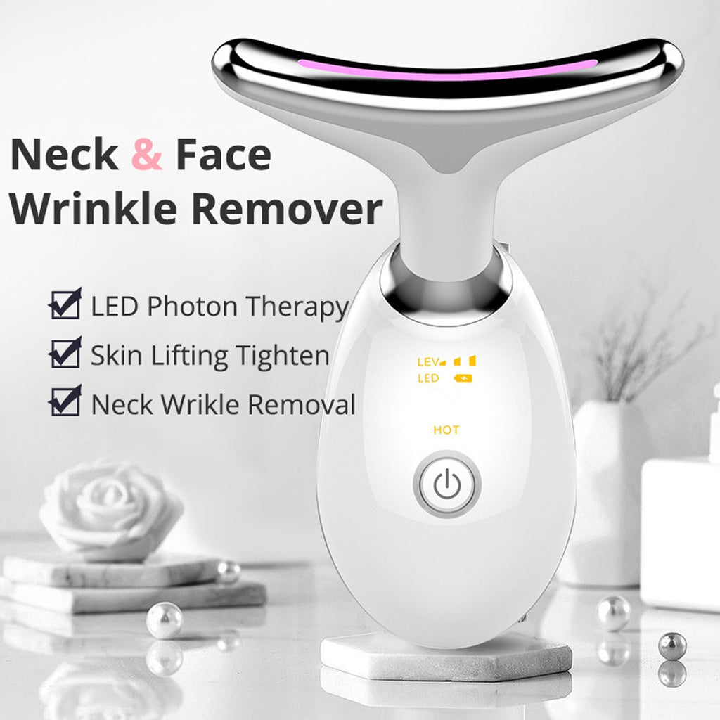 Electric face massager with LED lights in hand