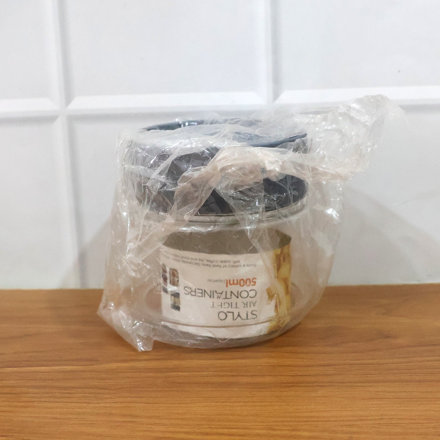 Clear kitchen storage container with tight-fitting airtight lid