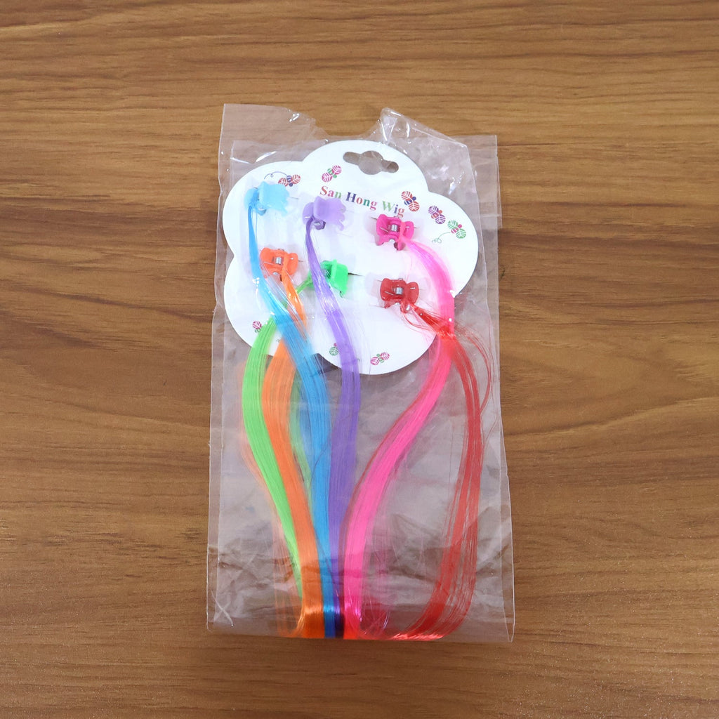 Bright synthetic kids hair extensions clipped in hair for party styling
