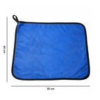 Comparison shot of microfiber cleaning cloth next to other cleaning towels