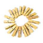 Bamboo cloth clips creatively used to hang decorative string lights for ambiance.