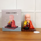 Decorative solar Buddha statue gently moving in peaceful posture
