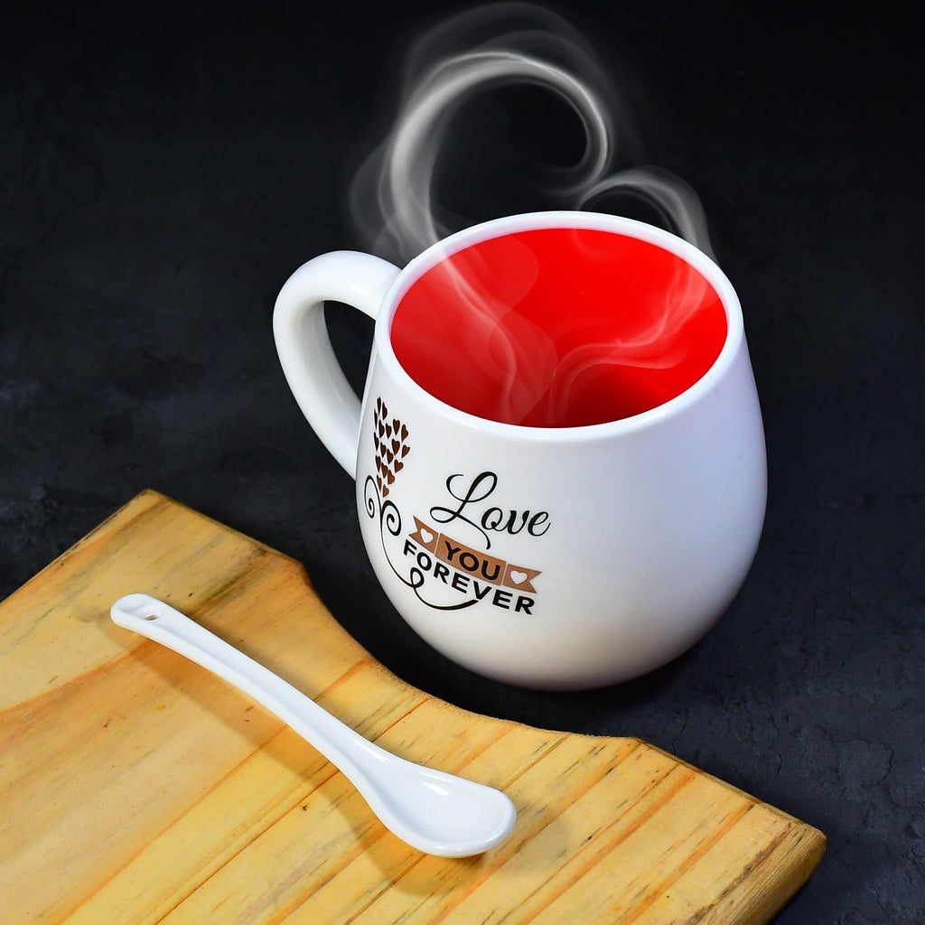 Thoughtful gift: a multi-design plastic coffee mug with a spoon.