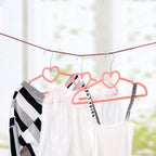 Nylon clothesline rope secured between two points for efficient drying.