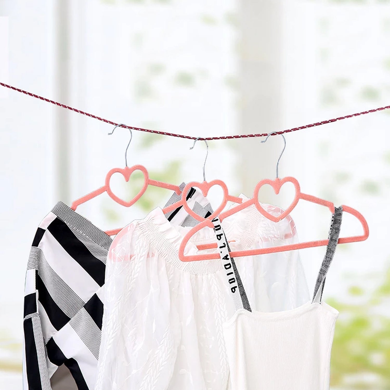Nylon clothesline rope secured between two points for efficient drying.