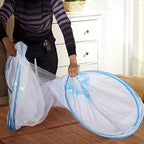 Self-supporting foldable polyester mosquito net tent setup over sleeping area