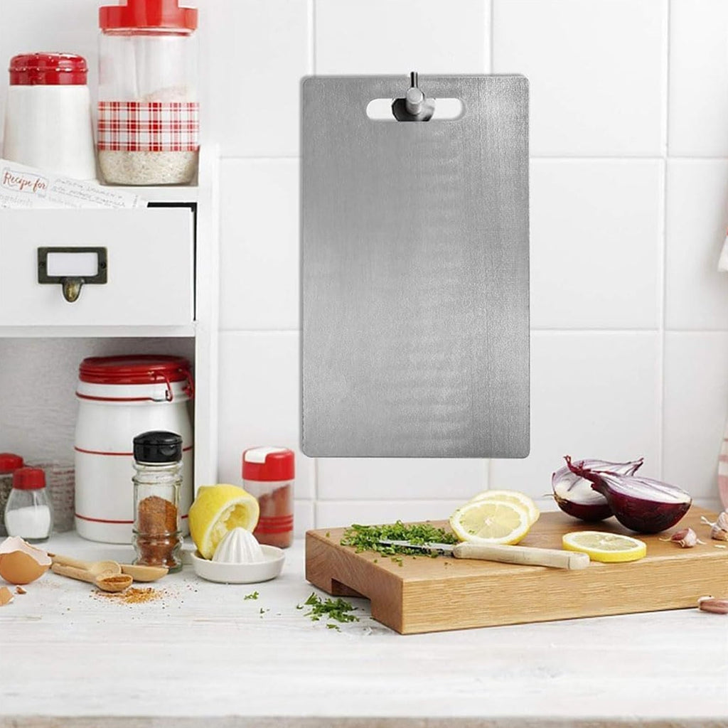 Close-up of hygienic stainless steel chopping board surface