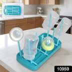 Compact baby bottle drying rack stand holder with multiple holders for feeding accessories