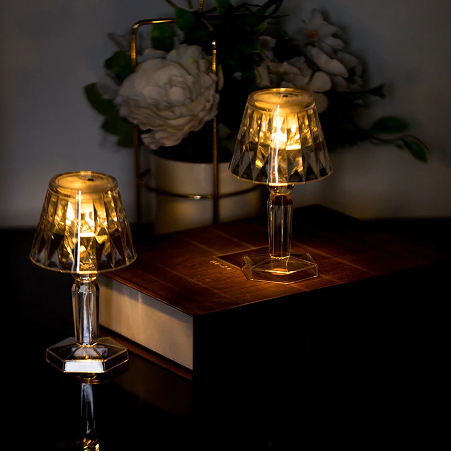 A crystal table lamp projecting beautiful light reflections.