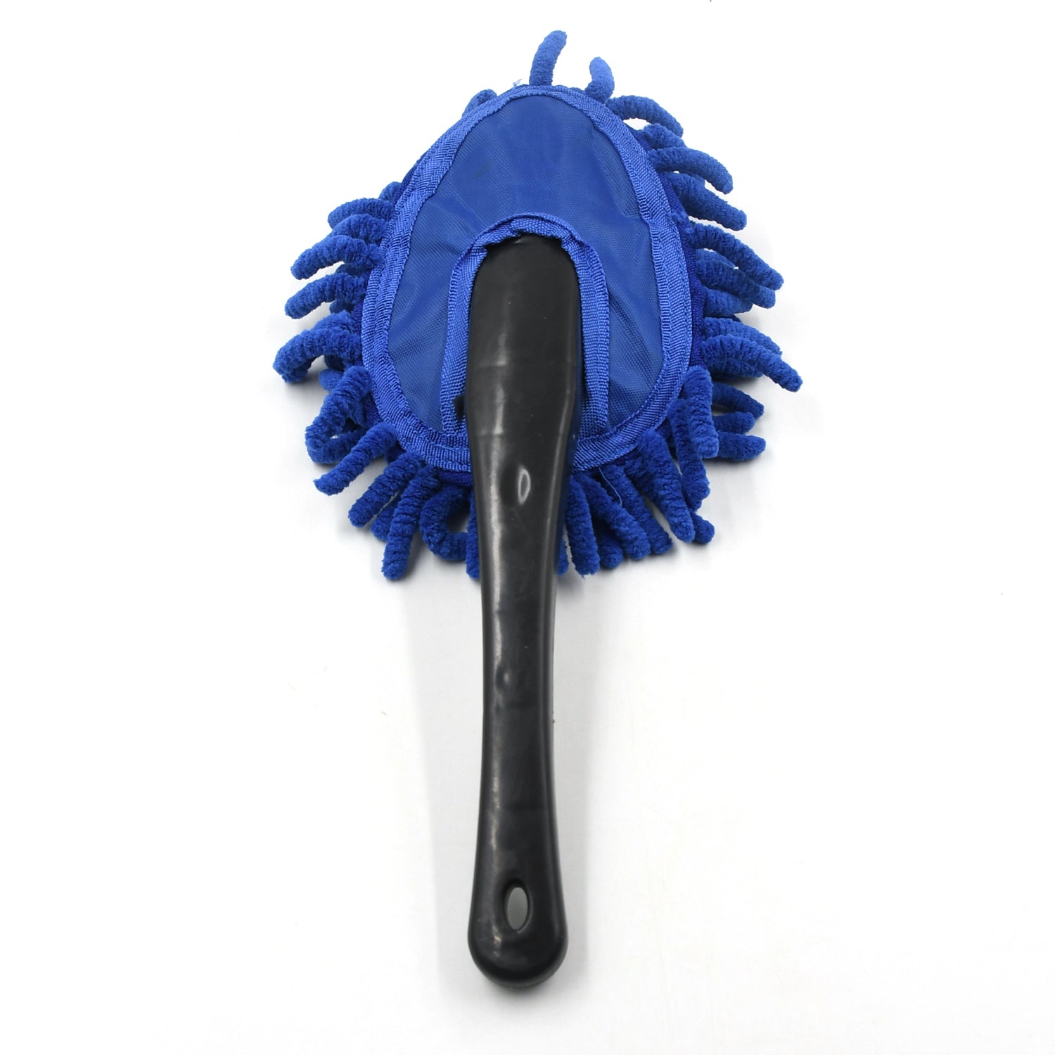 Microfiber car wash brush effectively removing dirt from a car's exterior body panel, leaving it spotless.