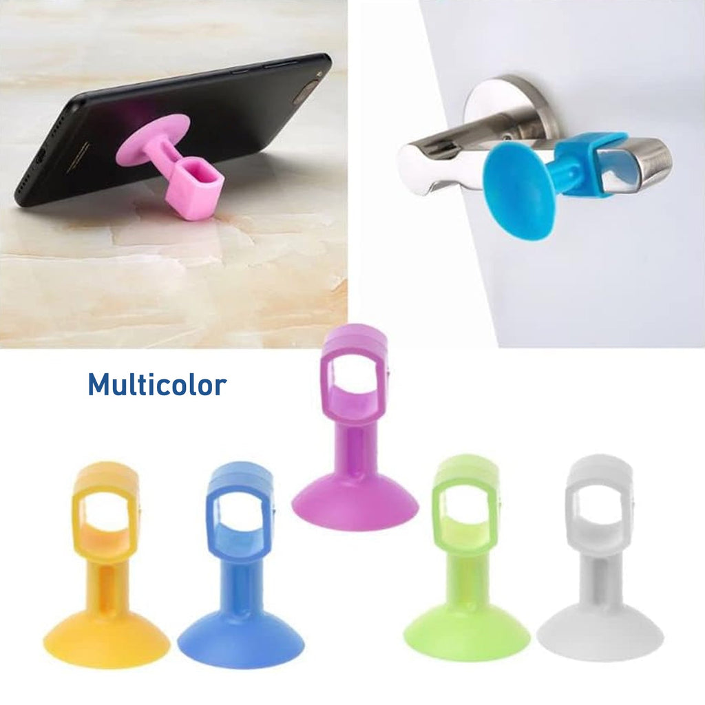 Self-sucking silicone door stopper mounted securely on a smooth wall.