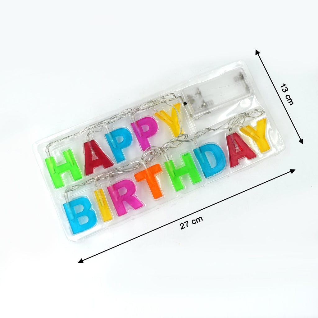 Happy Birthday LED string lights multicolour glowing softly in a party setting