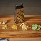 Versatile 5-sided stainless steel grater ideal for grating vegetables and fruits.