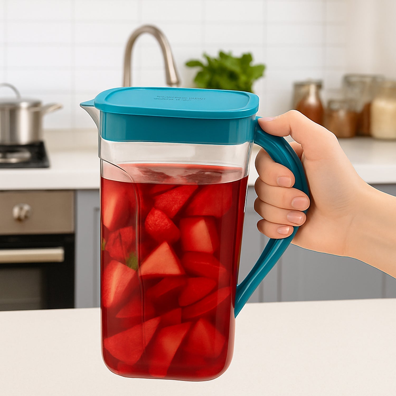 Plastic juice jug side view showing secure lid and ergonomic handle