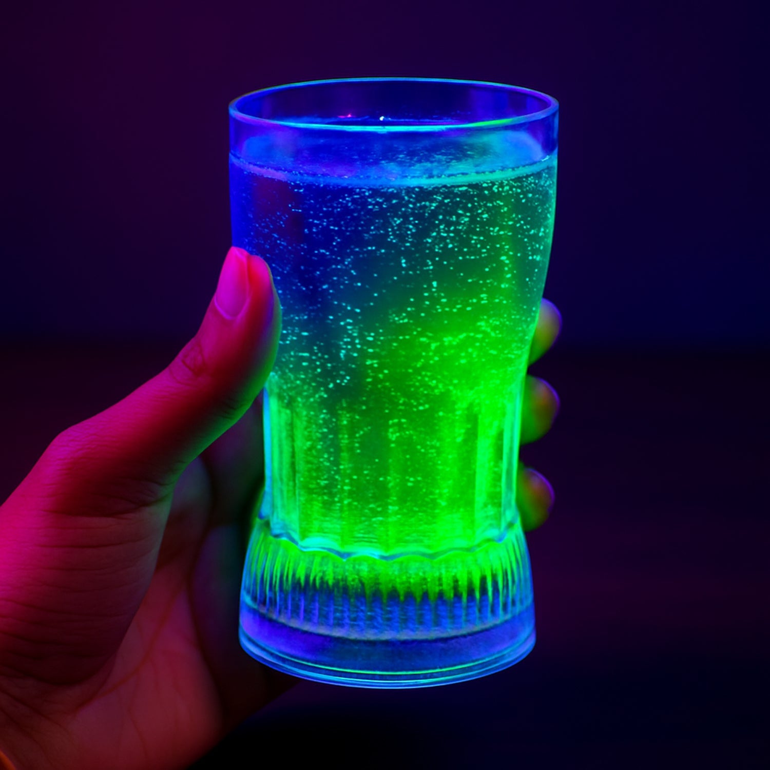 Elegant table setting featuring the LED Light Glass glowing vibrantly.