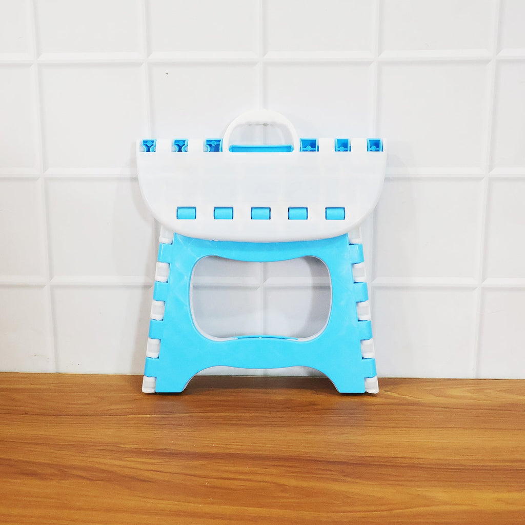 Side view of foldable step stool highlighting slim portable design