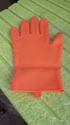 The Right-Handed Thumb Cutter Glove in action, picking fresh vegetables safely.