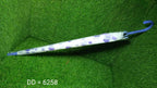 Another view of the elegant dot printed umbrella, highlighting its design.