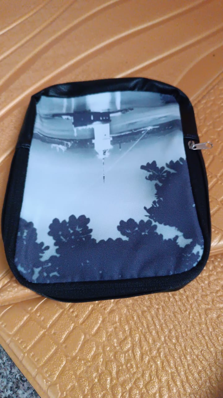 Close-up of the Glimmerly Period Kit Bag's soft velvet and Oxford fabric texture.