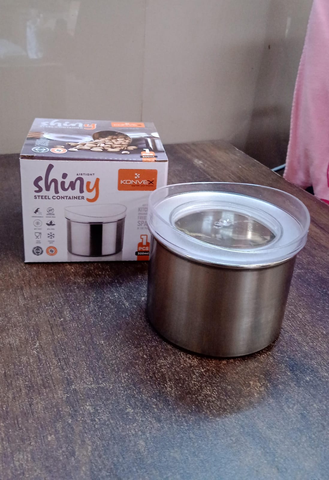 Side view of the versatile stainless steel container, ideal for pantry organization.
