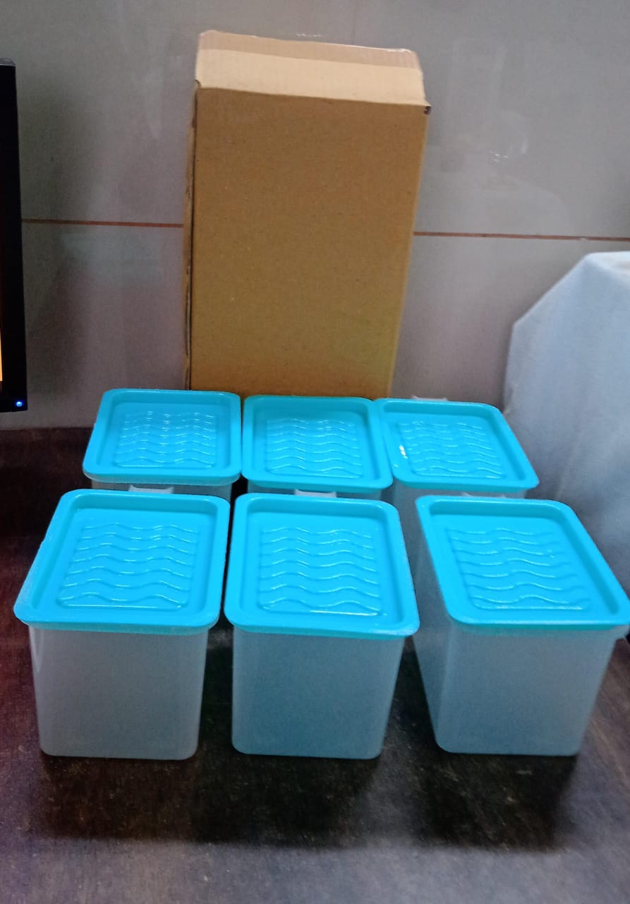 Empty square plastic container for versatile kitchen use.