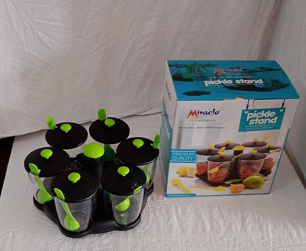 A full view of the Miracle revolving spice rack, ready for use in any modern Indian kitchen.