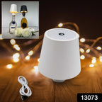 Wireless USB table lamp illuminating a wine bottle, creating a warm indoor ambiance.