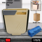 A person demonstrating the collapsible design of the space-saving waste bin.