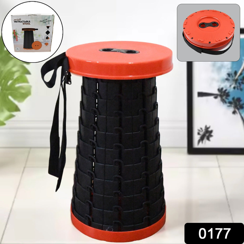 A person easily carrying the lightweight retractable folding stool with its adjustable strap.