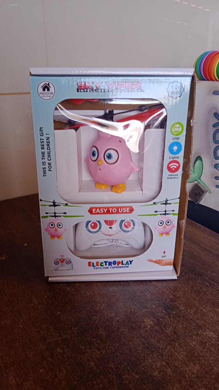 Packaging of Electroplay Flying Bird RC Toy with pink owl illustration