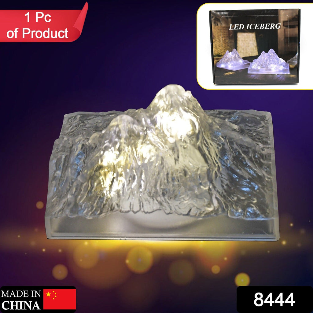 Side view of the Iceberg Night Light, highlighting its textured plastic surface and soft glow.
