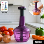 Compact manual vegetable chopper showing push-down mechanism and handle