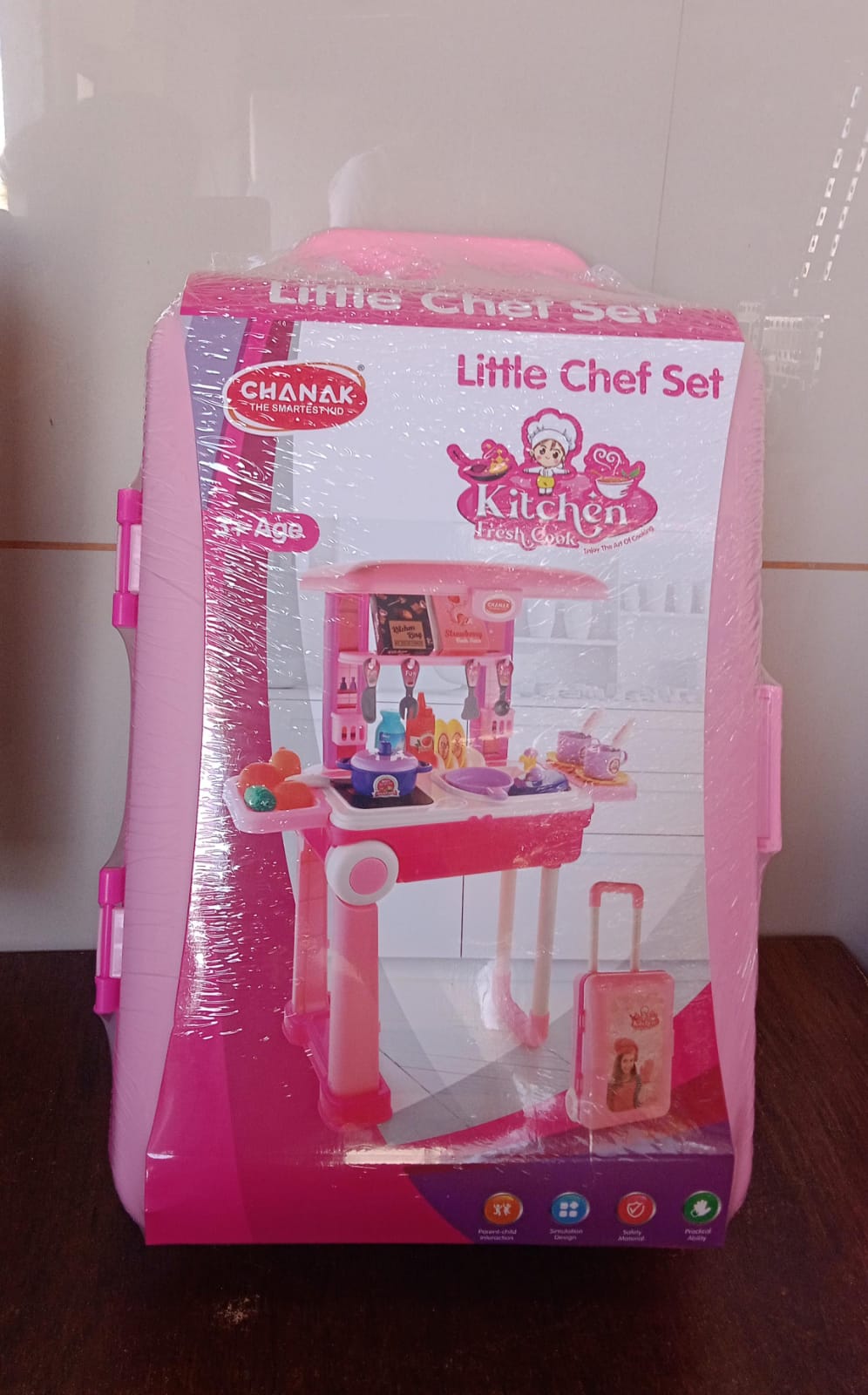 Detailed view of the pretend play kitchen set components